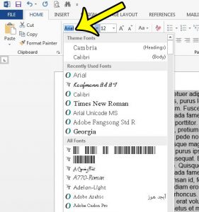 how to change the font for an entire document at once in Word 2013